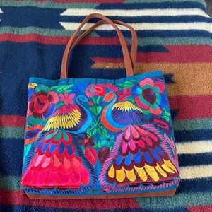 Colorful Peacock Embroidered handbag from Honduras.